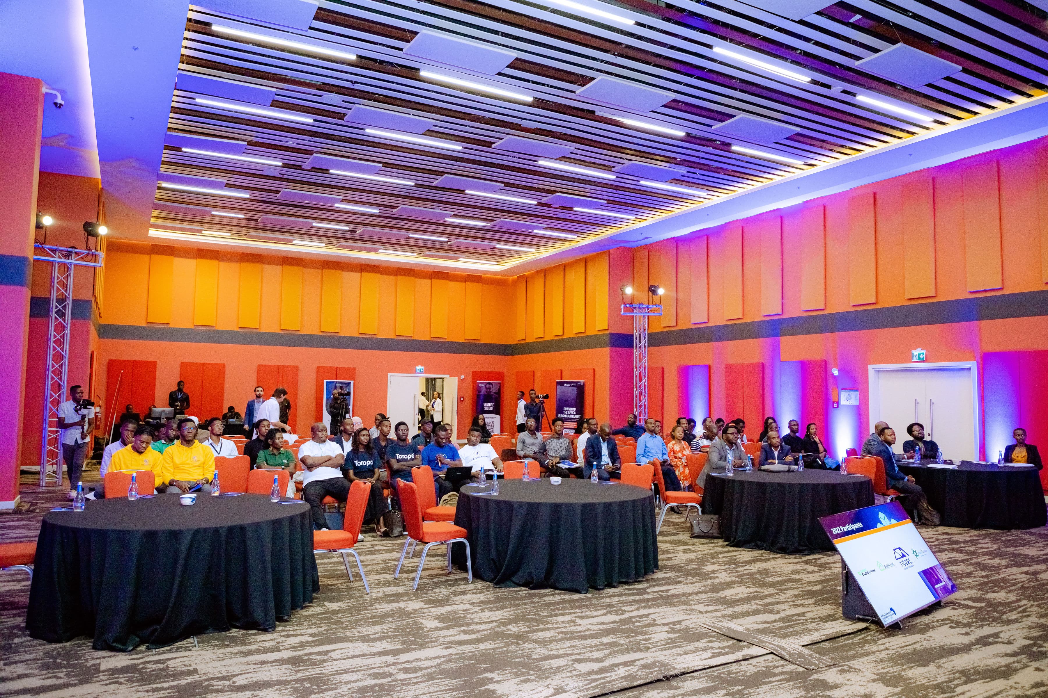 Conference attendees gathered in a research session